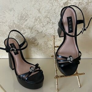 stunning 5" heel with rhinestone knot. From Bloomingdale’s/ Aqua brand